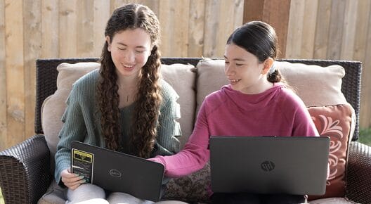 girls talking and studying