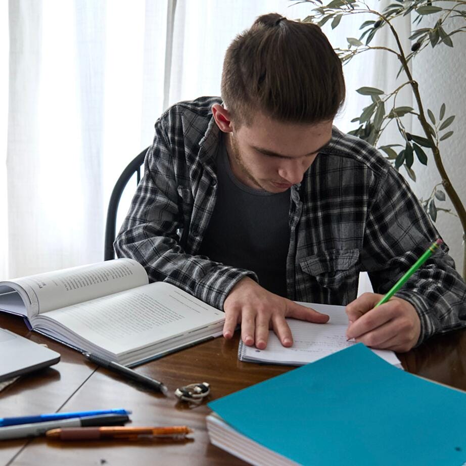 Student taking notes