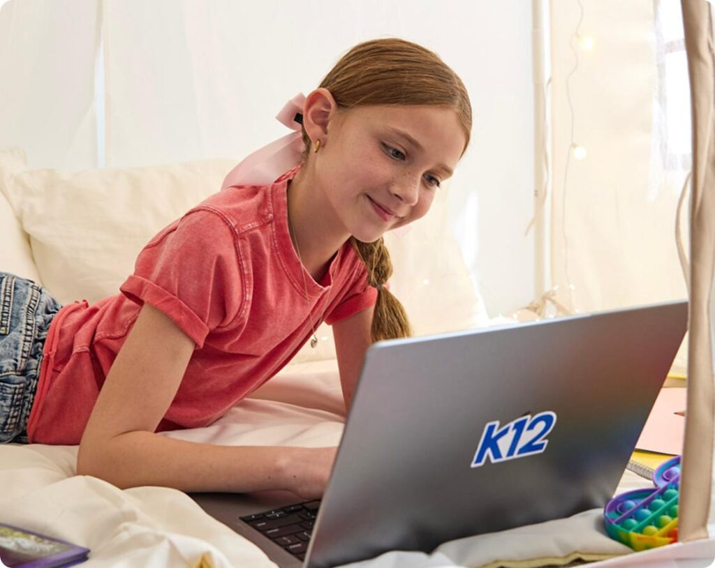 Student working with her laptop at home