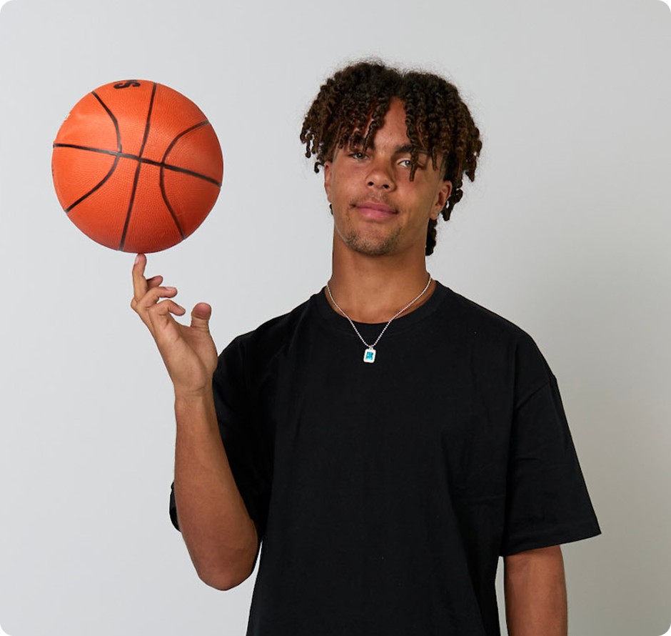 High school student with a basketball