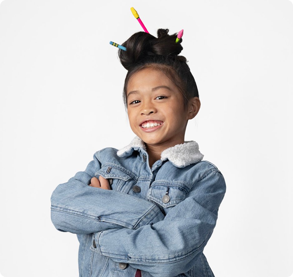 Student smiling at the camera