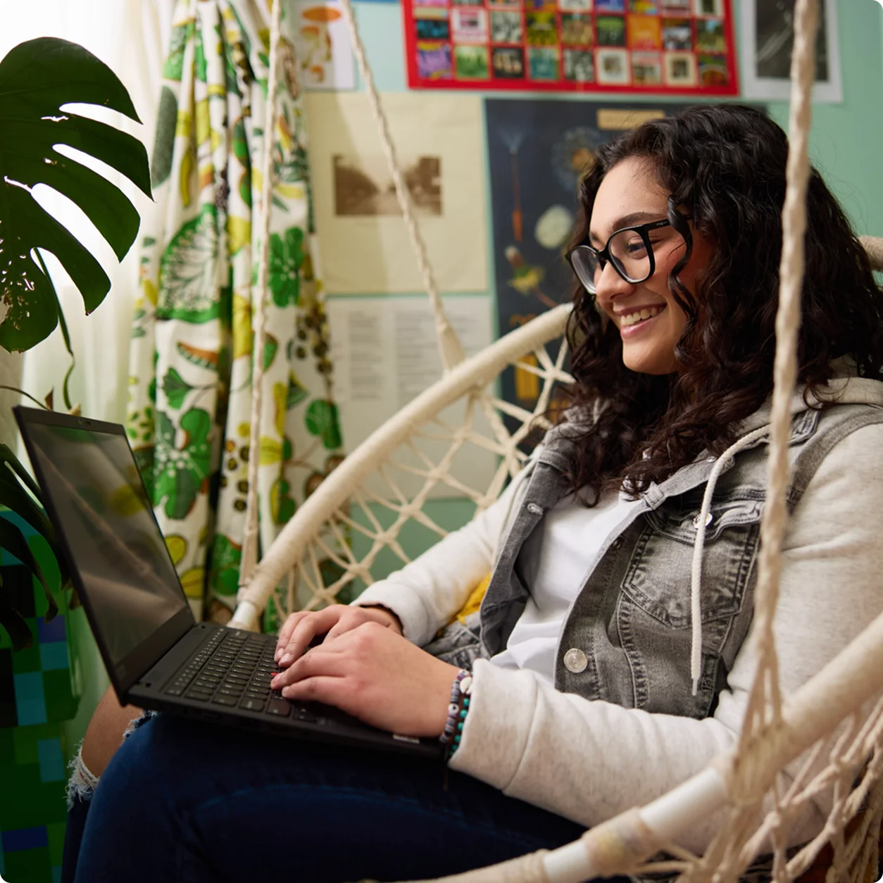Student working with their laptop